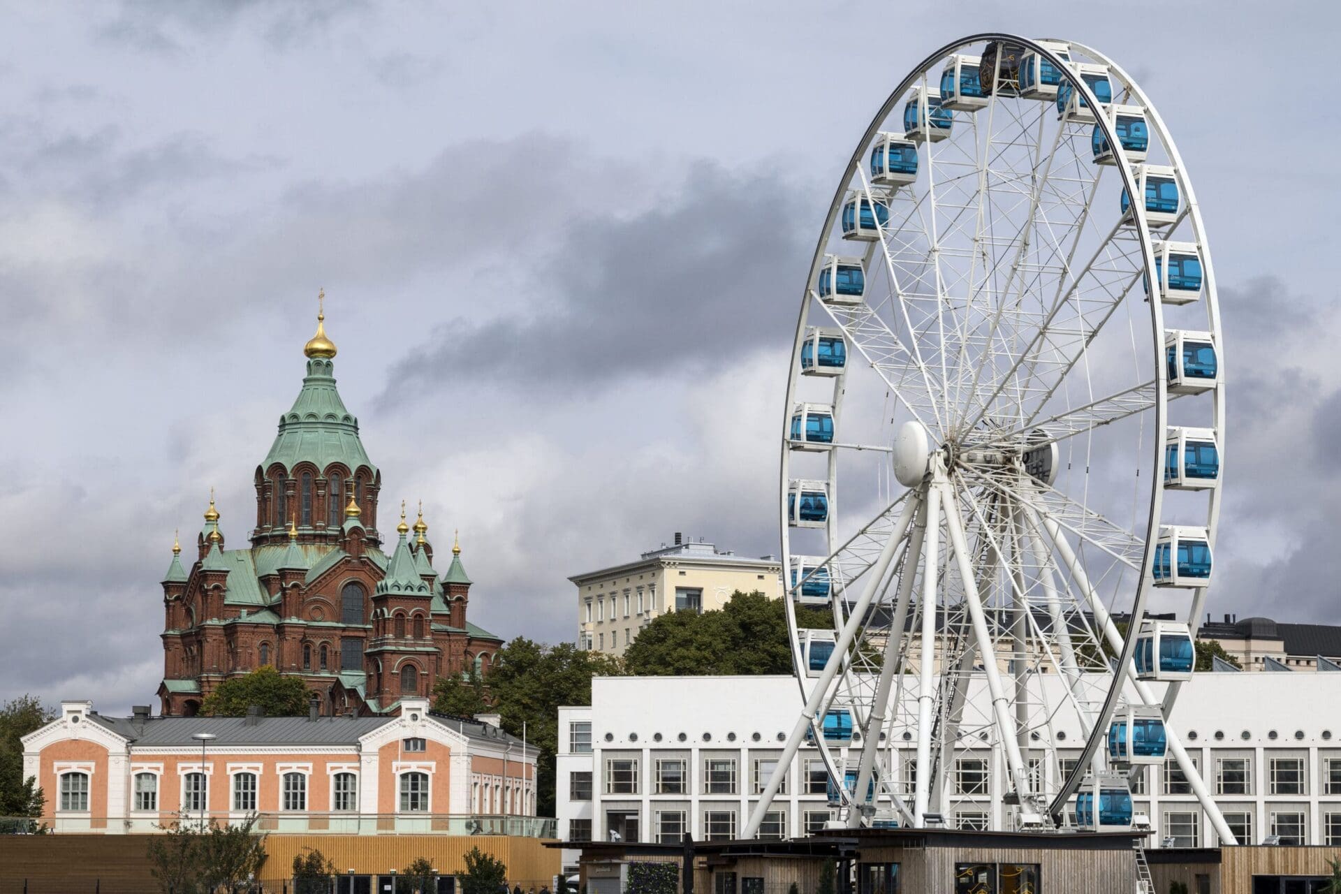 Uspenski Cathedral and Skywheel - Helsinki - Finland. Uspenski Cathedral and the Skywheel in the city of Helsinki in Finland.